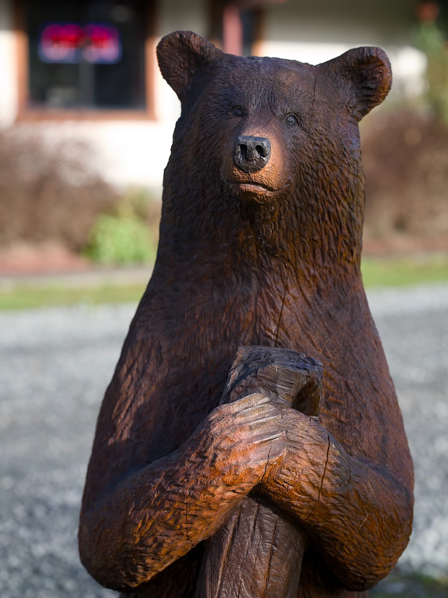 Wood carving of a bear at Paradise Village Restaurant in Ashford
